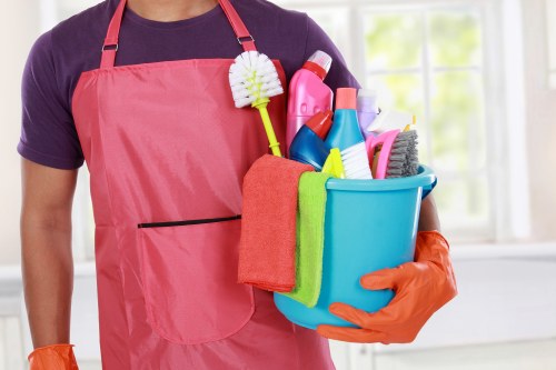 Cleaning team discussing ethical labour standards in Enfield