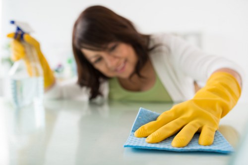 Local office cleaners working in a business premises in Enfield